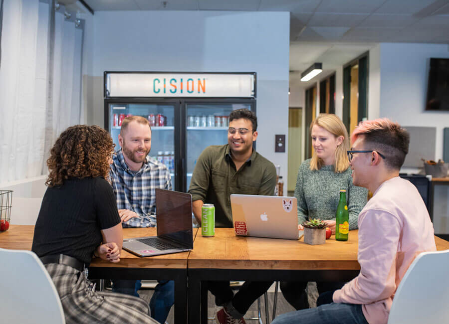 Coworkers Meeting in Lunch Room
